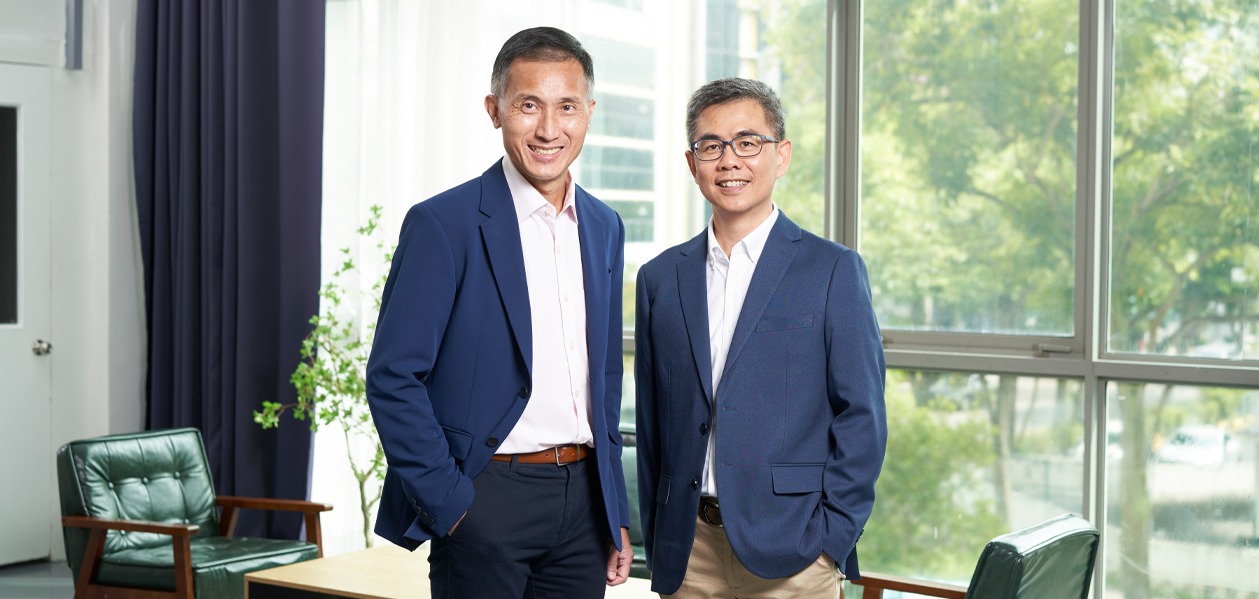 [From left] Mr Wong Lup Wai passes the leadership baton to Mr Michael Goh, who will lead IPI Singapore into its next chapter of innovation.